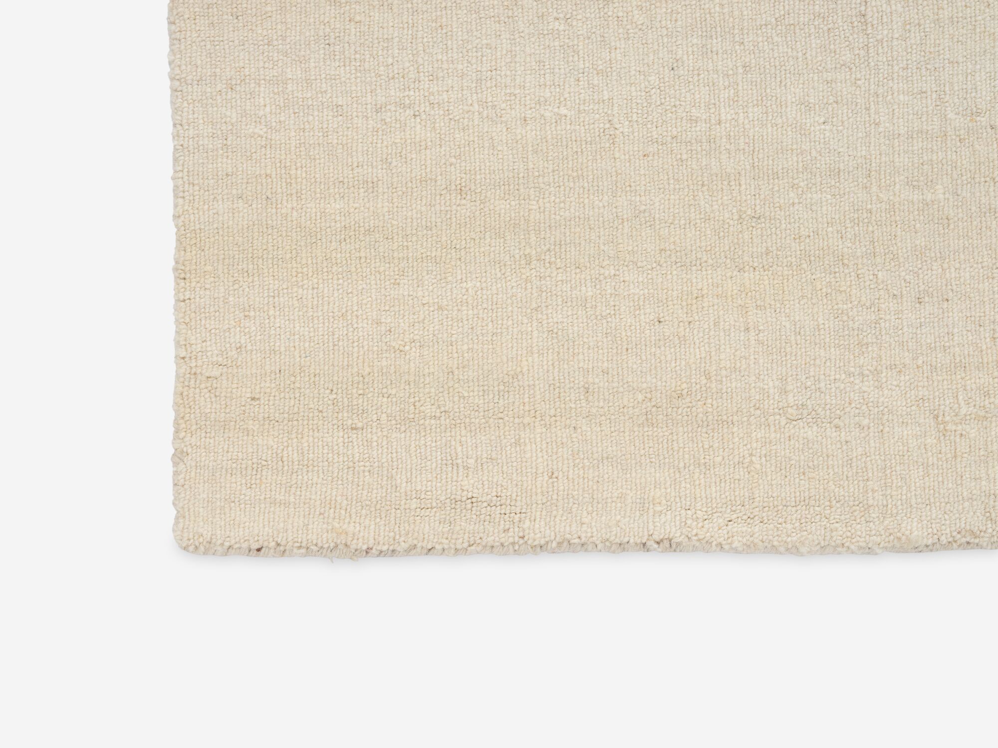 Detail view of large beige and black abstract pattern area rug